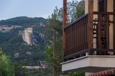 Single with partial view of Meteora and Mount